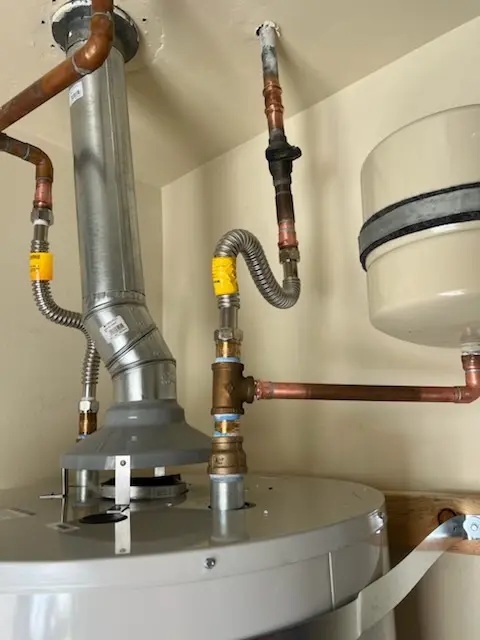 Water heater installation and plumbing repair in Sweetser